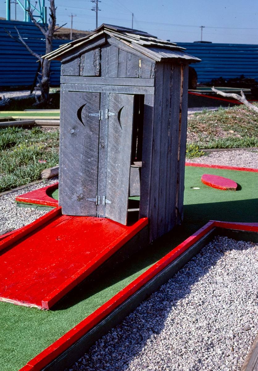 Historic Photo : 1987 Outhouse, Mini-Golf at Flags of Fun Amusement Park, Rapid City, South Dakota | Margolies | Roadside America Collection | Vintage Wall Art :