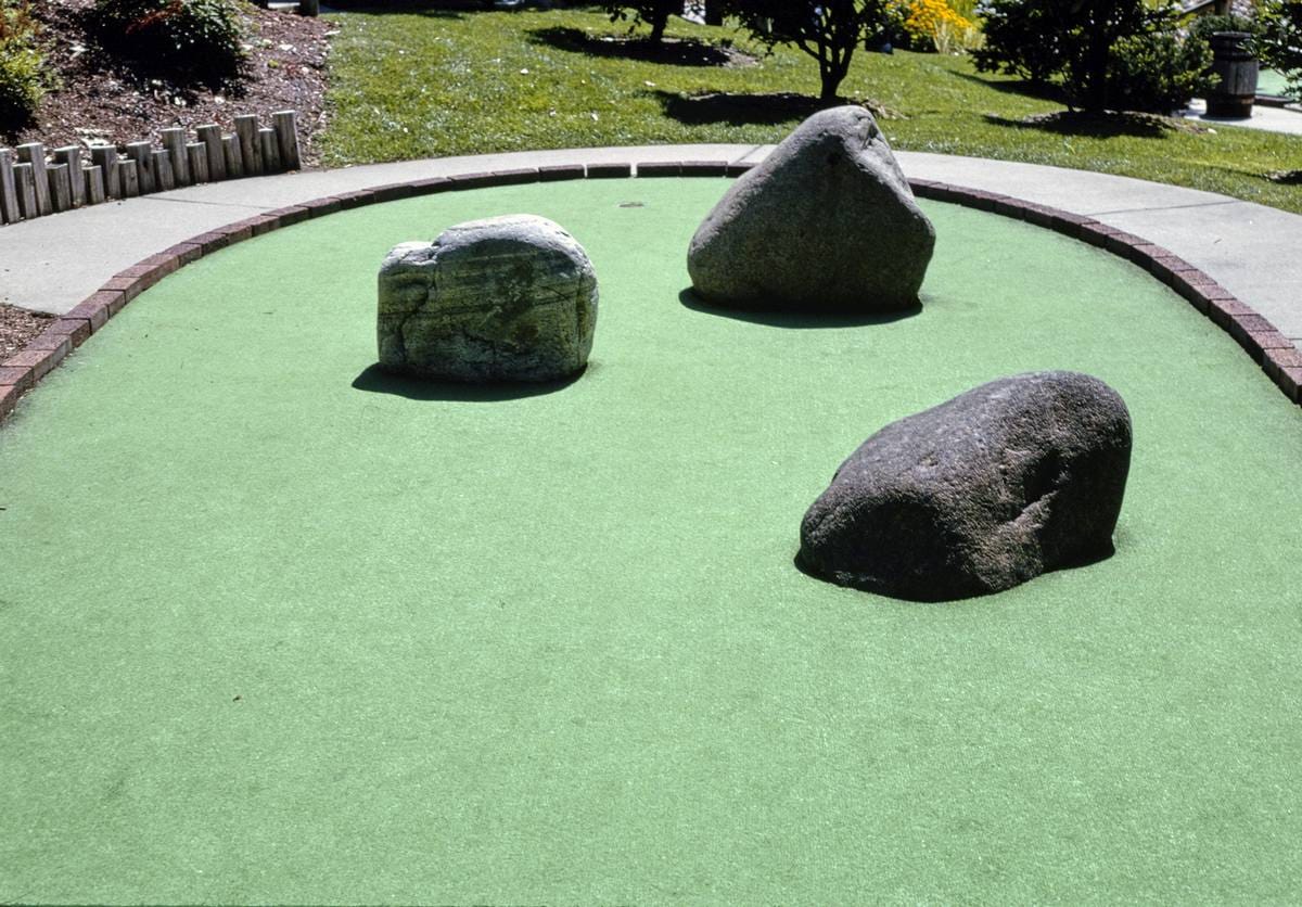 Historic Photo : 2002 Circular hole with three boulders, Pirate's Cove Adventure Golf, Queensbury, New York | Margolies | Roadside America Collection | Vintage Wall Art :