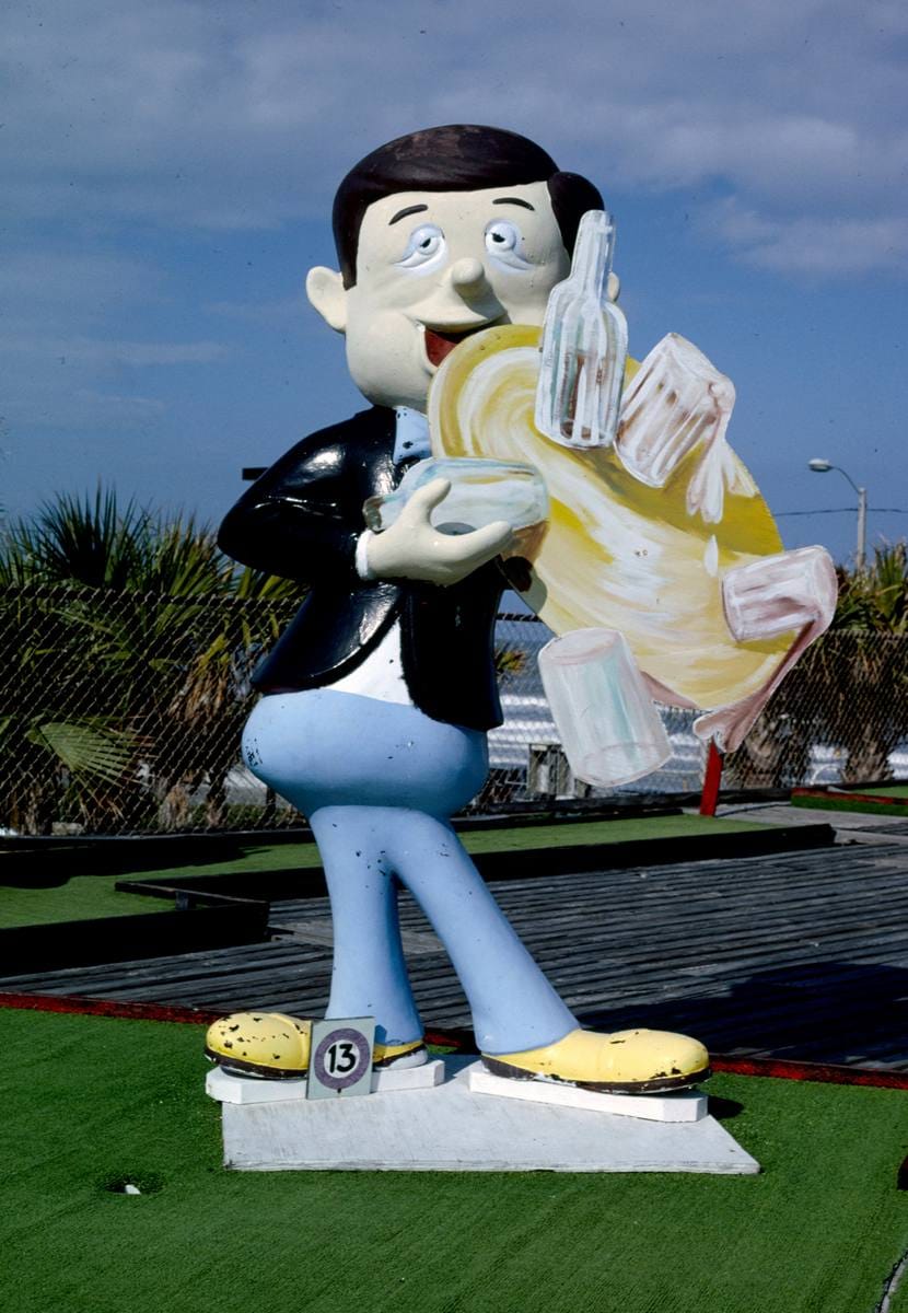 Historic Photo : 1990 Waiter, Joyland Golf, Daytona Beach, FLA, 1990., Daytona Beach, Florida | Margolies | Roadside America Collection | Vintage Wall Art :