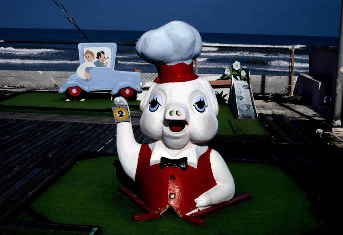 Historic Photo : 1990 Pig chef and auto, Joyland Golf, Daytona Beach, Florida | Margolies | Roadside America Collection | Vintage Wall Art :