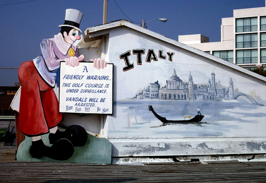 Historic Photo : 1990 Vandalism sign and Italy, Joyland Golf, Daytona Beach, Florida | Margolies | Roadside America Collection | Vintage Wall Art :