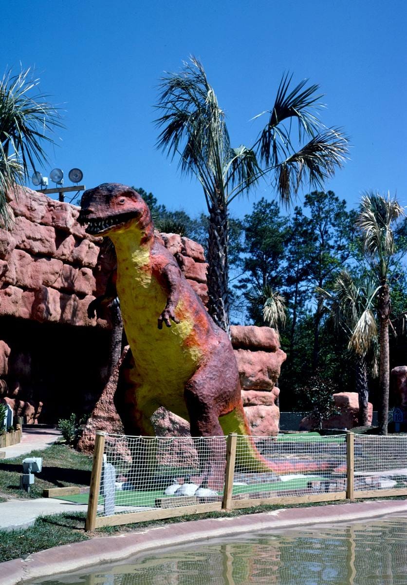 Historic Photo : 1988 Dinosaur overall vertical, Rainbow Falls Golf, Myrtle Beach, South Carolina | Margolies | Roadside America Collection | Vintage Wall Art :