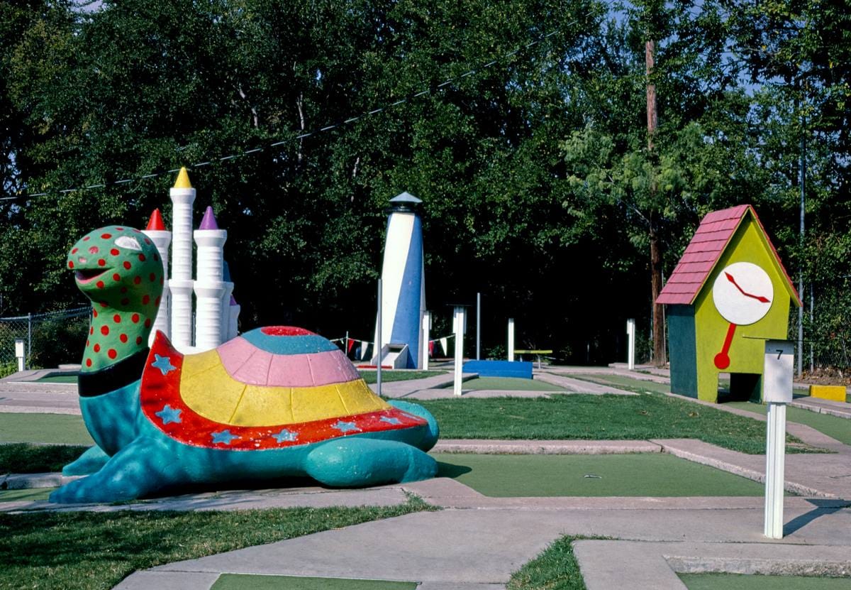 Historic Photo : 1983 Tortoise and clock house, Peter Pan mini golf, Barton Springs Road, Austin, Texas | Margolies | Roadside America Collection | Vintage Wall Art :