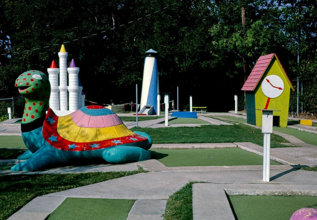 Historic Photo : 1983 Tortoise and clock house view 2, Peter Pan mini golf, Barton Springs Road, Austin, Texas | Photo by: John Margolies |