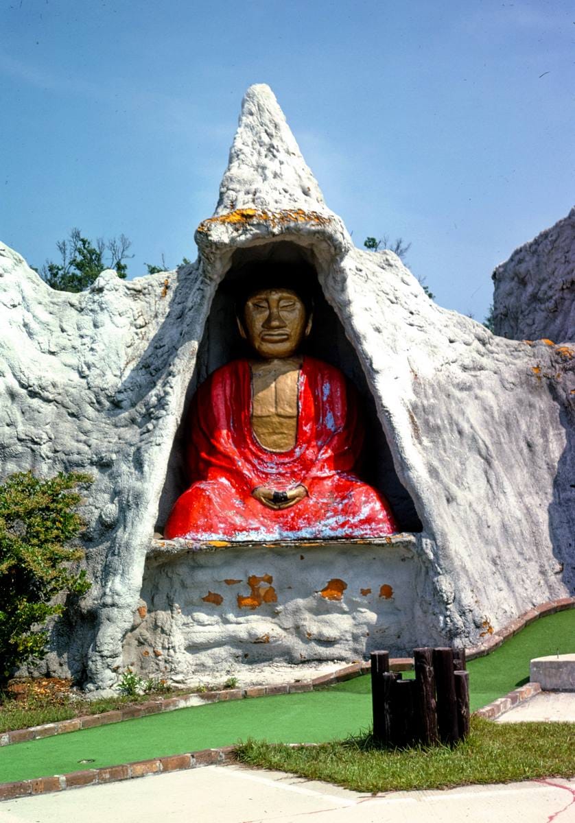 Historic Photo : 1979 Buddha in rock, Wacky Golf, Garden City, South Carolina | Margolies | Roadside America Collection | Vintage Wall Art :