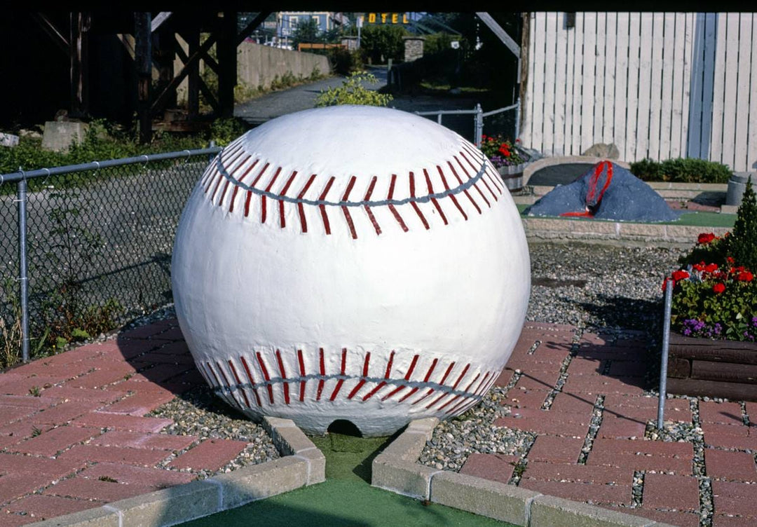 Historic Photo : 1984 Giant baseball hole, Salute to the USA mini golf, Lake Winnipesaukee Pier, Weirs Beach, New Hampshire | Photo by: John Margolies |