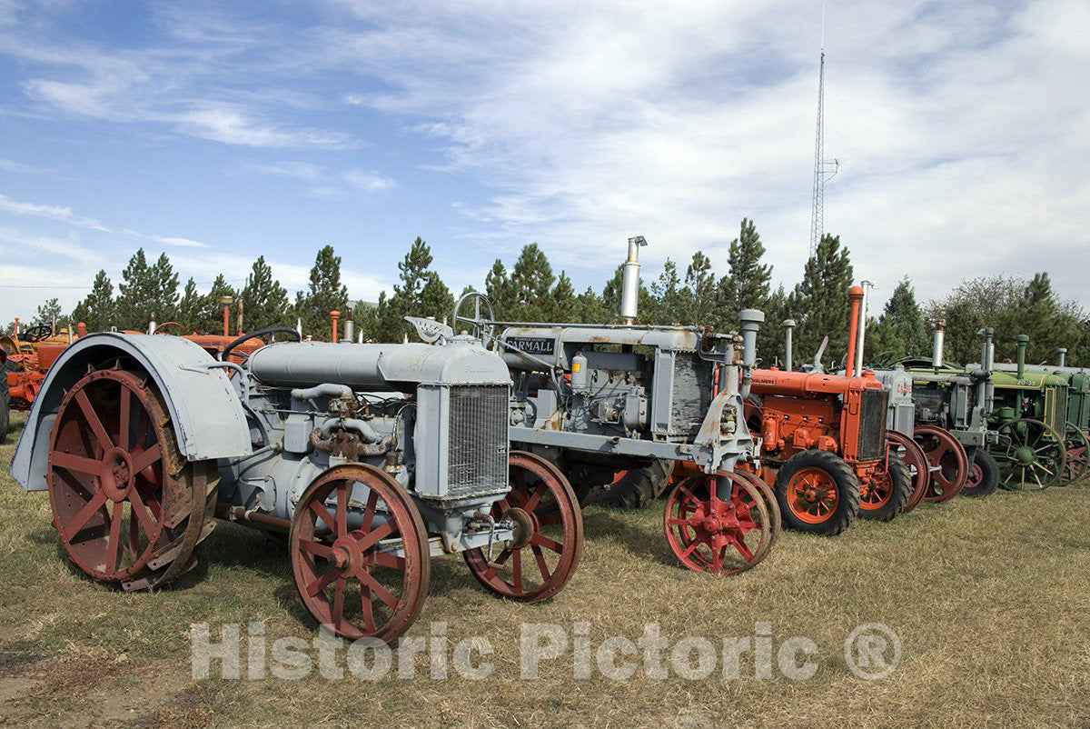 Montana Photo - Old tractors along the road