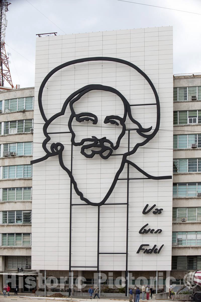 Photograph- Camilo Cienfuegos, Fidel Castro's right-hand man and confident during the revolution, is outlined in iron on the front facade of this building on Revolution Square in Havana, Cuba