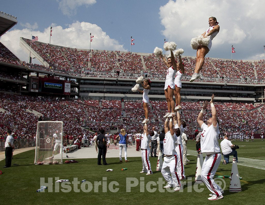 Tuscaloosa, AL Photograph - The cheerleaders are amazing to watch. The boys throw the girls into the air as they cheer on their winning team. University of AL football game, Tuscaloosa, AL