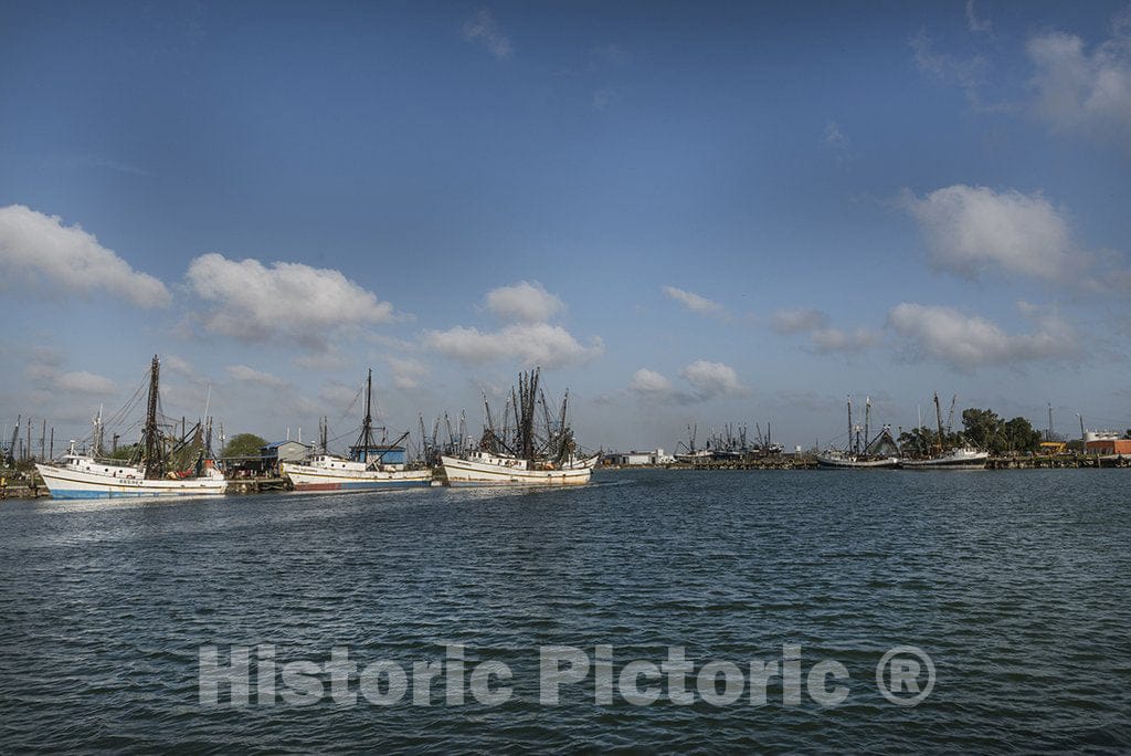 Brownsville, TX Photo - Shrimping trawlers moored in an Atlantic Ocean Inlet in Brownsville, Texas