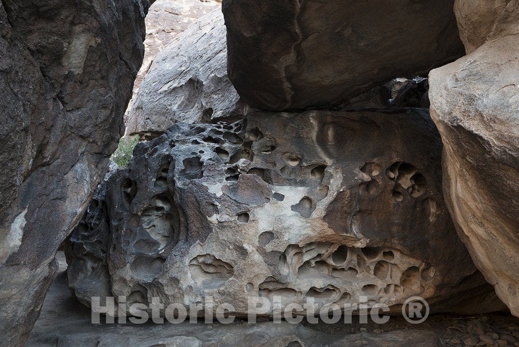 El Paso County, TX Photo - Pocked Rocks in Hueco Tanks State Park & Historic Site in The Low Mountains Above El Paso, Texas. The Weathered Rock is Ideal for Rockclimbing