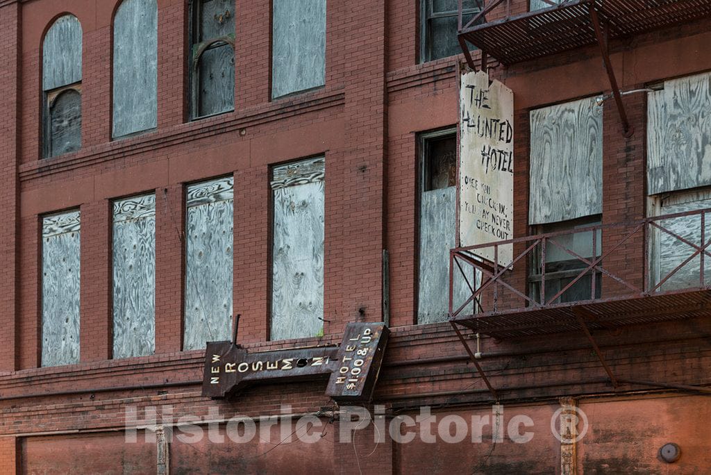 Photo - It's unclear who erected The Haunted Hotel Sign Outside This Long-shuttered Old Building in Downtown Beaumont, Texas- Fine Art Photo Reporduction