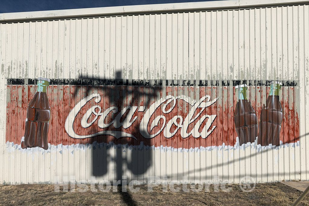 Alpine, TX Photo - The Shadow of a Telephone Pole Accents an Old Coca-Cola Sign on a Building Outside Alpine, Texas