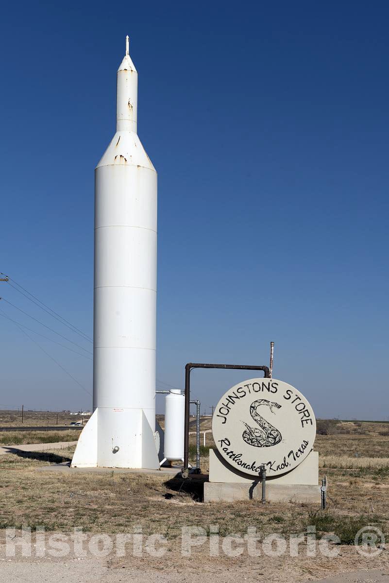 Photo- A nonfunctioning Rocket (so far as we can Tell) Outside a Little Store in a Place (Rattlesnake Knob) That Doesn't Exist (so far as we can Tell) in Gaines County, Texas