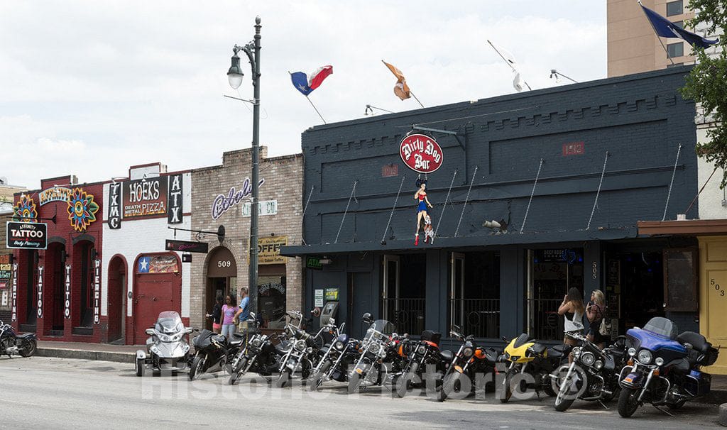 Austin, TX Photo - Motorcycles Parked Outside The Dirty Dog Bar on East Sixth Street, Locally Known as Dirty Sixth, in Austin, Texas