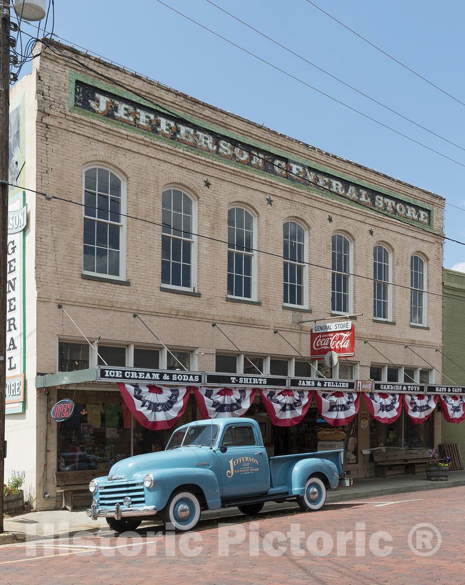 Photograph - A 1950s-vintage truck outside a general store in Jefferson, a town in Marion County in East Texas on whose main street almost every commercial building, and many nearby homes 1