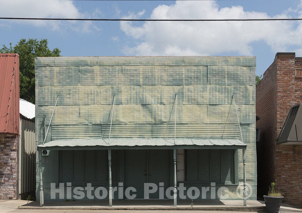 Emory, TX Photo - an Abandoned Building clad in Painted Sheets of tin in Emory, The seat of Rains County in East Texas