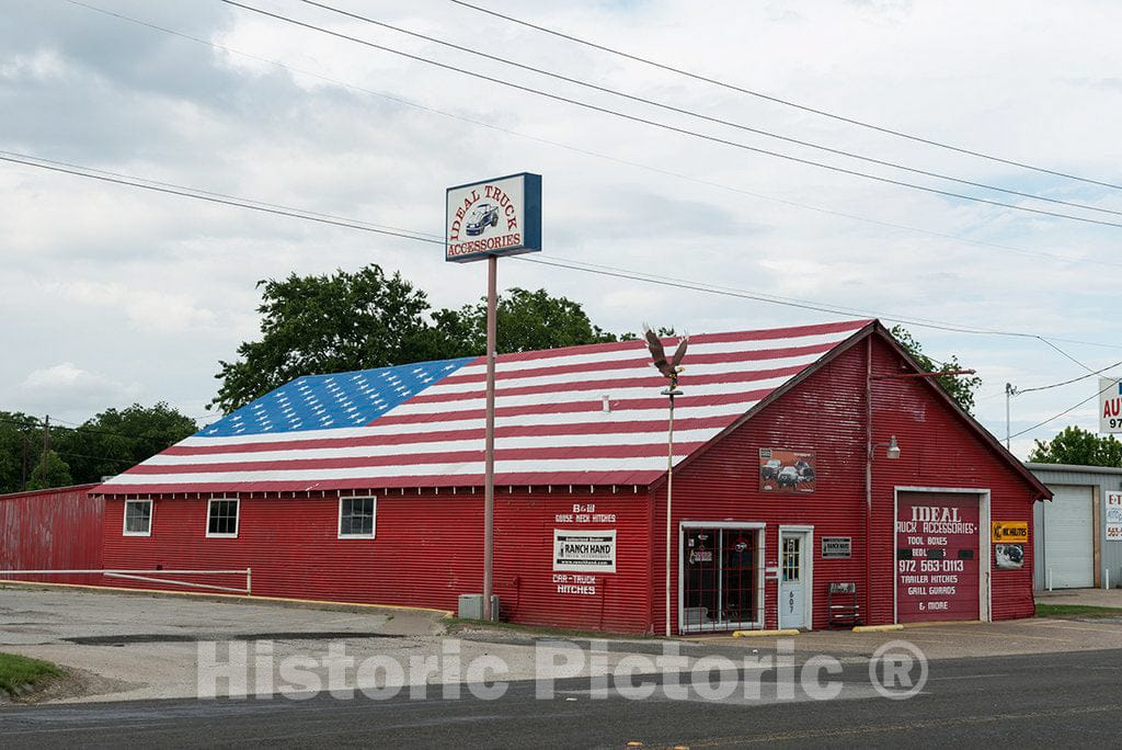 Photo - Truck-parts store with a colorful, patriotic-themed painted roof in Terrell, Texas, east of Dallas- Fine Art Photo Reporduction