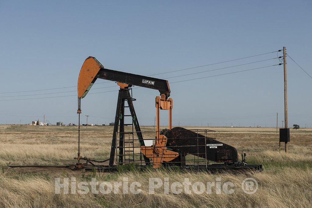 Gray County, TX Photo - A pumpjack, sometimes referred to as a"grasshopper" oil pump because of its appearance, in rural Gray County, near Pampa in the Texas panhandle