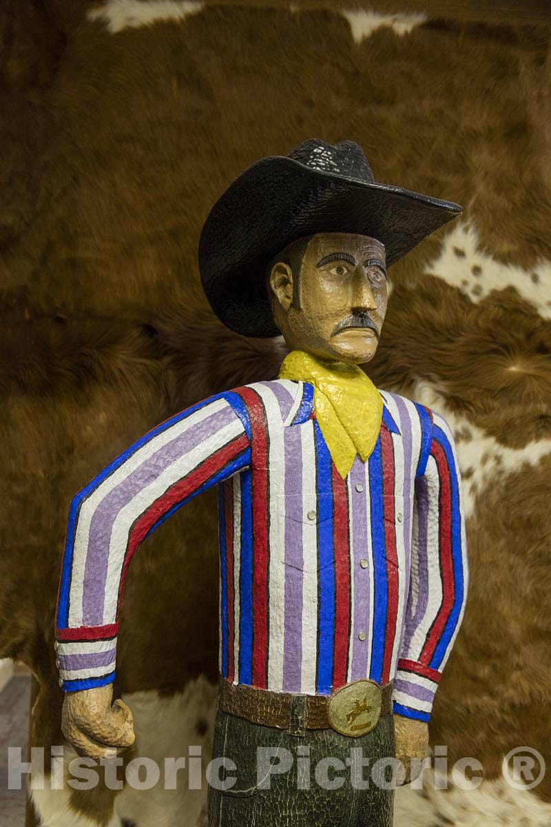 Photo- A six-foot-tall woodcarving by Russ Eichenberger at the West Texas Trail Museum in Moorcroft, Wyoming, where herds of Texas longhorn cattle pushed through in the late 1800s