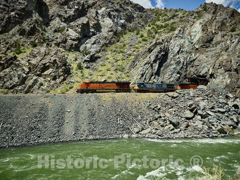 Photo - A Freight Train emerges from a Tunnel in The Rocks of The Wind River Valley That Runs roughly from Shoshoni up to Thermopolis in North-Central Wyoming