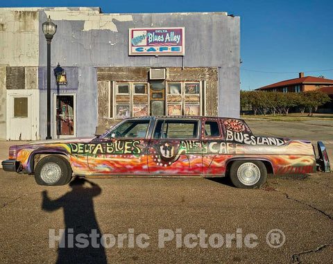 Photo- Vintage car from the days of oversized, gas-guzzling vehicles, decorated with a scrawled homage to the town's rich blues heritage, in Clarksdale 2 Fine Art Photo Reproduction