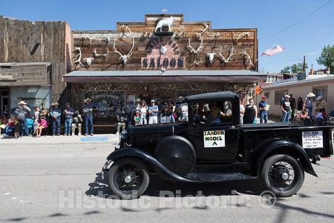 Photo- A Vintage car Passes The White Wolf Saloon in Douglas, Wyoming During The Wyoming State Fair's Annual Kickoff Parade 3 Fine Art Photo Reproduction