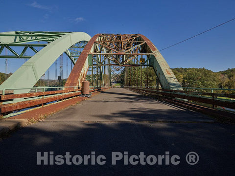 Photo- An old bridge near Dummerston, Vermont, right, became a footbridge after a newer span over the Connecticut River to its right, replaced it. Across the bridge is New Hampshire